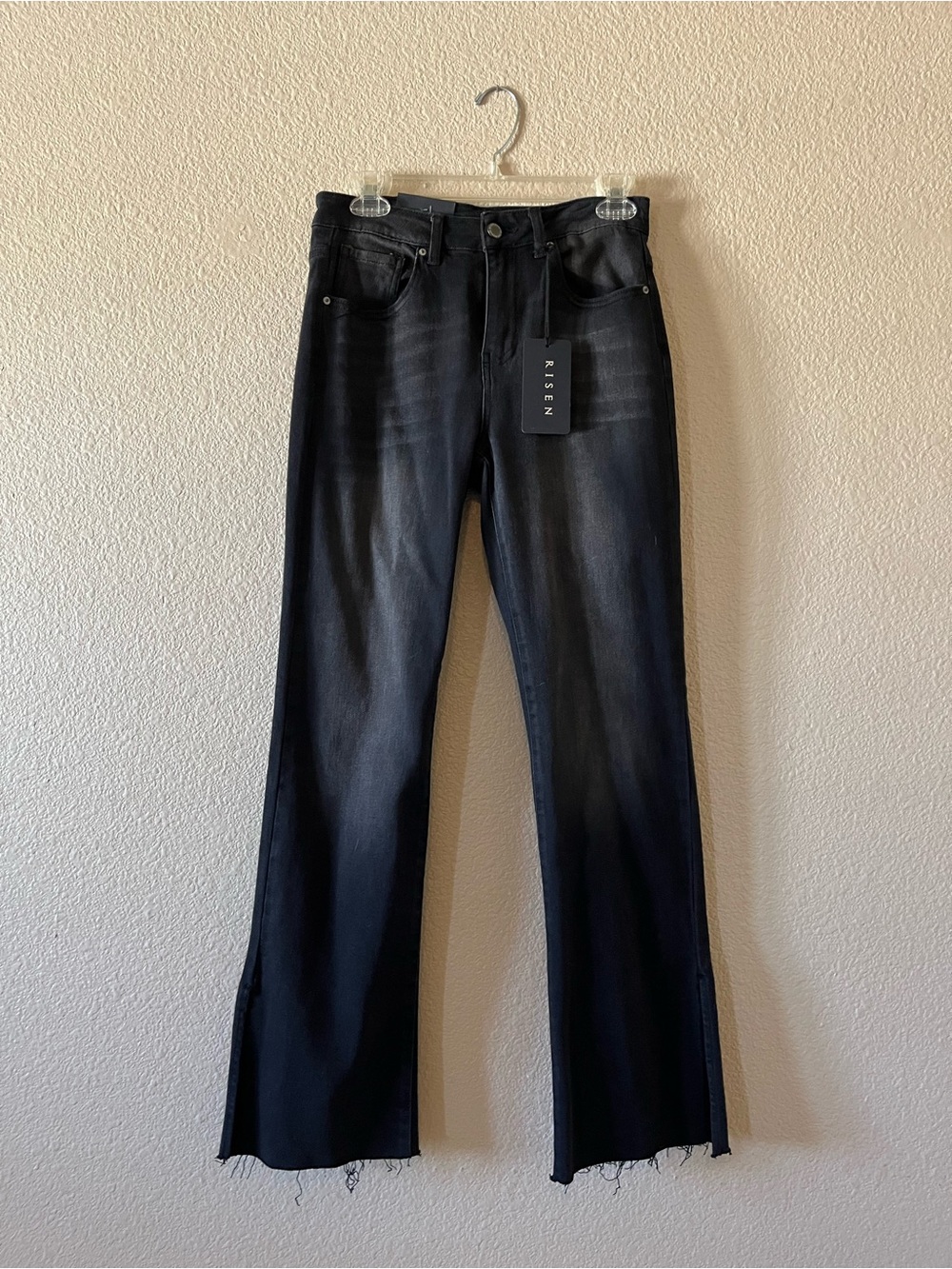Risen high rise raw hem straight leg with slit jeans. Black. Size 27/3